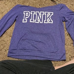 A pink sweat shirt size small